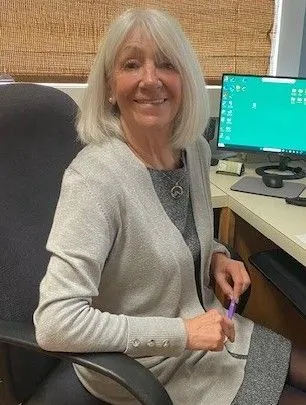 Pat, Receptionist